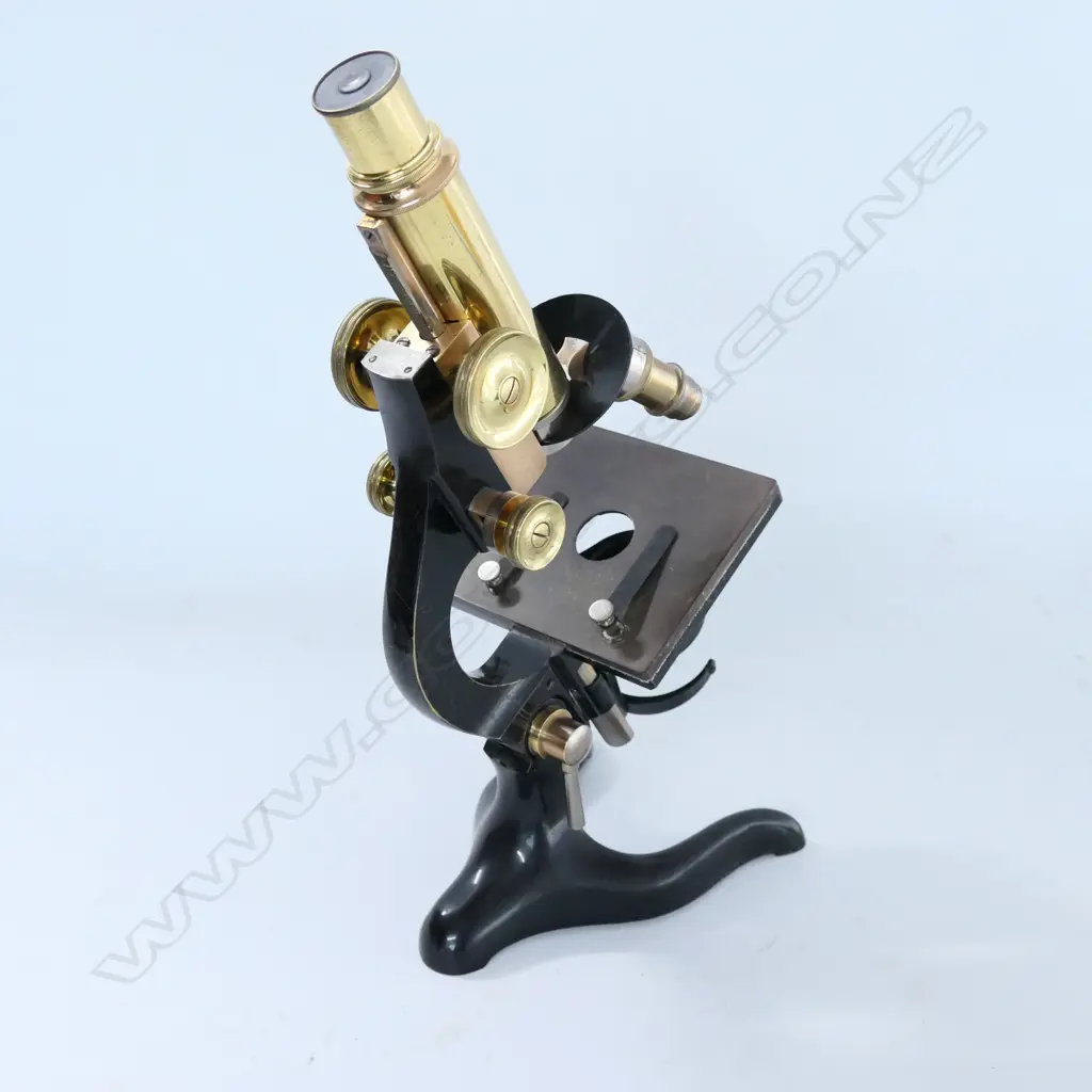 ERNEST LEITZ, WETZLER MICROSCOPE No.105503, w EBONIZED STIRRUP FOOT, CURVED LIMB, CONDENSER. MIRROR ABSENT. IN MAHOG BOX Image 1++